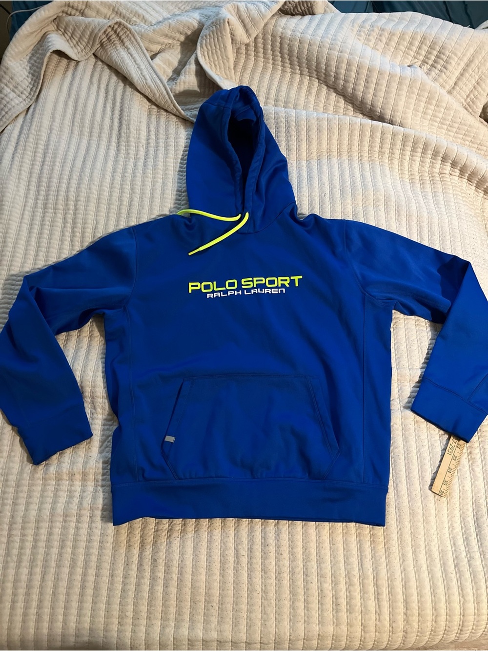 Kids blue jacket care label close-up